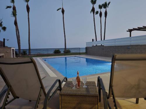 Pervolia Villa | Amazing frontline beach villa