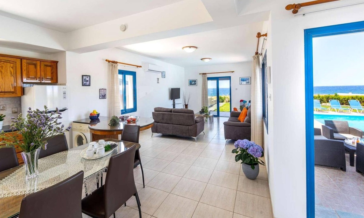 Pomos Villa | Beachfront 3 bed villa with sea views.