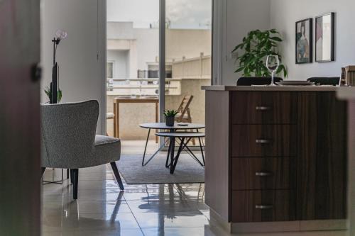 Livadia Apartment | Creative 1br Pool view Apt with covered parking