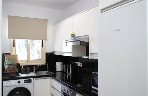 Universal House | Elysia park - Charming 2BR Townhome with Pool, Gym, Free parking-Paphos central