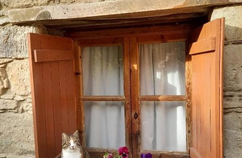 Lemona Cottage | Lantana Stone House. Where the wild thyme scents the stone.