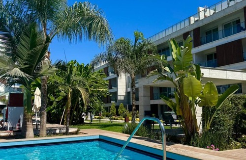 Trikomo Apartment | Modern Family Apartment with Pool & Balcony near Long Beach - Iskele