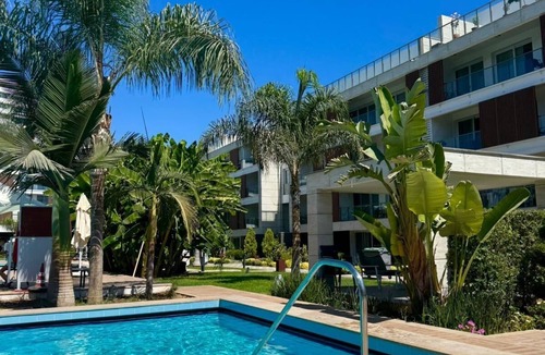 Trikomo Apartment | Modern Family Apartment with Pool & Balcony near Long Beach - Iskele