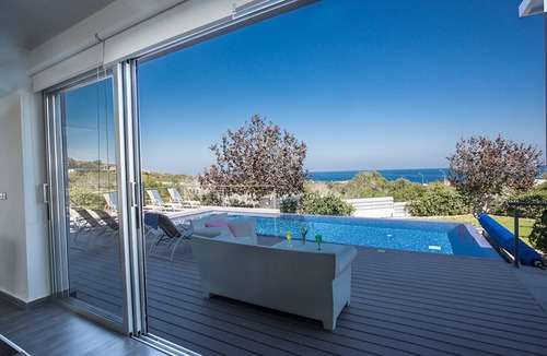 Protaras Villa | Picture Relaxing Beside Your Private Pool in Protaras Reading Your Favourite Book