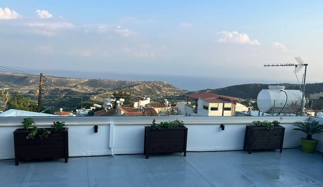 A traditional village house with a roof terrace and superb views in Pissouri