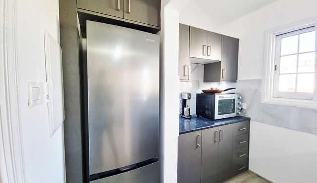 Amazing location, surrounded by palm trees and just 200 meters from the beach! in Larnaca