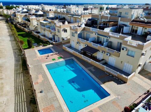 AquaSol Suite Modern 2BR with Shared Pool