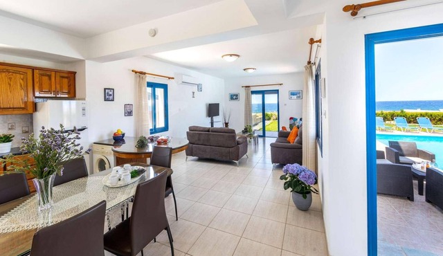 Beachfront 3 bed villa with sea views. in Pomos