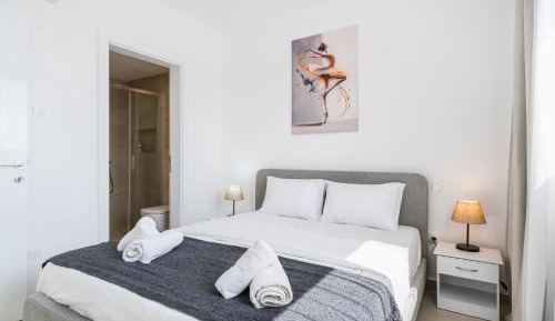 One-Bedroom Apartment with Balcony and City View