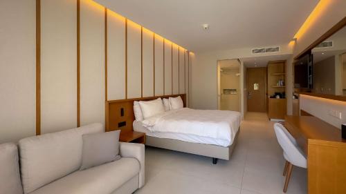 Garden Suite with Balcony and Pool View