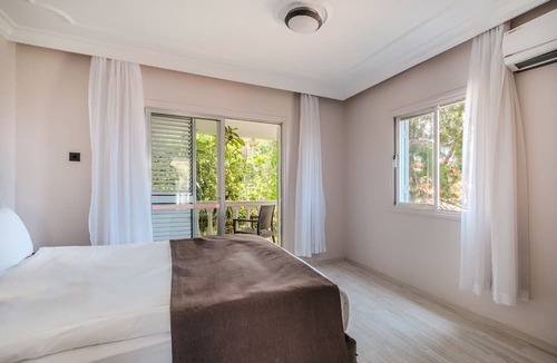 Karavas Villa | Riverside Coastal Retreat
