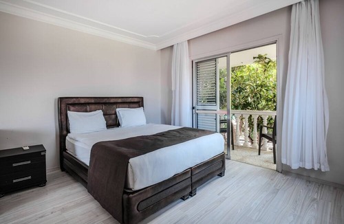 Karavas Villa | Riverside Coastal Retreat