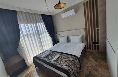 Karakum House | Chic Flat w Pool 5 min to Beach in Kyrenia