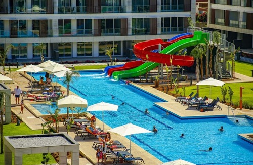 Trikomo Apartment | Delightful Studio Flat Close to the Beach with Shared Pool and Balcony in Iskele, Cyprus