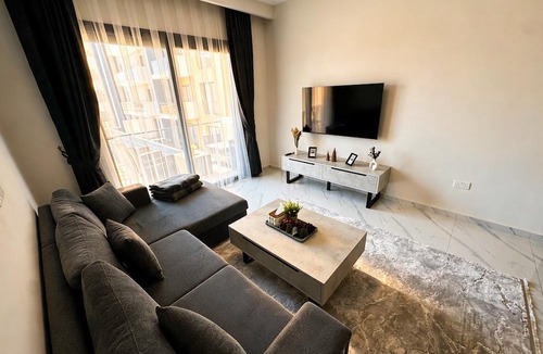 Trikomo Condo | Riverside Life Resort: Modern Apartment with Ocean View & Pool