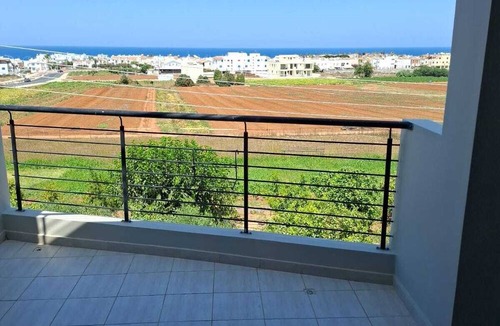 Kapparis Apartment | Top floor apartmenT with community pool and sea views