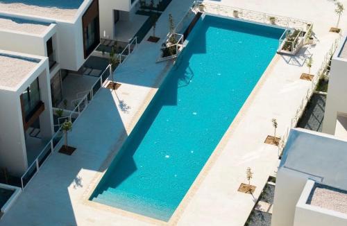 Emba Apartment | Avalon Gardens A202 - Designer Resort Apartment