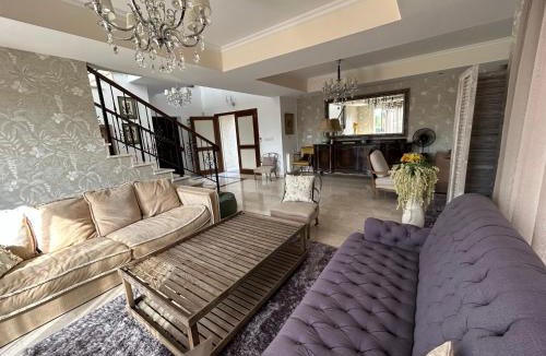 Agios Tychon Villa | SeaView 6BR Villa with Heated Pool, Spa & Private Cinema