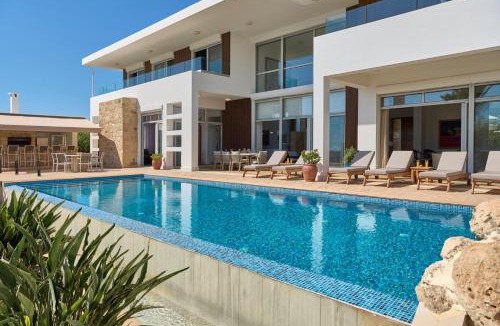 Pegeia Villa | Seafront Villa Kyma by Ezoria Villas