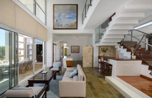 Pegeia Villa | Seafront Villa Kyma by Ezoria Villas