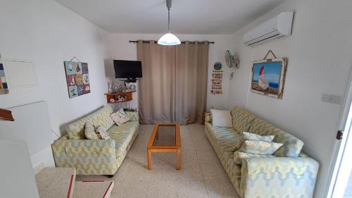 Pervolia Apartment | Comfortable 2BR Seaside House & Free Parking