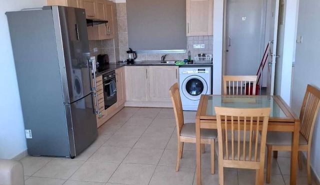 Top floor apartmenT with community pool and sea views in Paralimni
