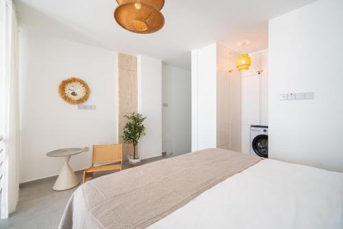 ELLI Azure Loft & 2-Floor Boho Duplex with Rooftop Terrace & Infinity View in Cyprus