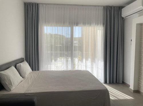 Family friendly modern flat in Caesar Resort &SPA, Long Beach İSKELE, KKTC